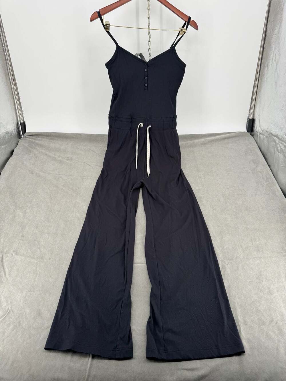 Vuori Pose Henley Jumpsuit Black Ribbed Wide Leg